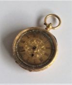 A lady's 18 carat fob watch attractively decorated
