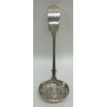 EXETER: A silver fiddle pattern sifter spoon. By J