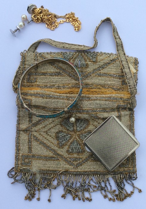 A stylish silver bead work purse together with a s