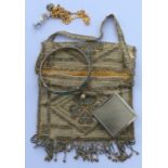 A stylish silver bead work purse together with a s