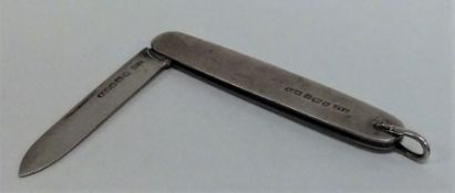 A novelty double sided silver penknife. Sheffield.