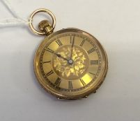 A lady's 18 carat gold fob watch with engraved decoration.