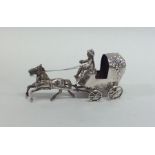 A large silver model of a horse and cart. Approx.
