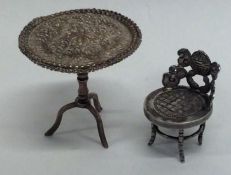 A small Continental silver model of a table togeth