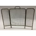 A small folding spark guard. Est. £20 - £30.