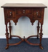 A good George I style burr walnut lowboy on stretc