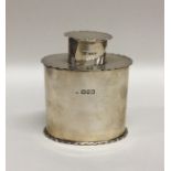 A good silver plain oval tea caddy with crimped ri