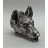 A novelty silver snuff box in the form of a dog wi