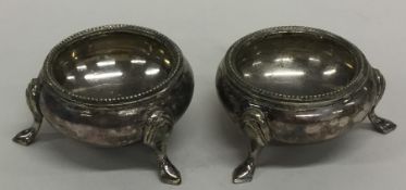 A pair of Edwardian tapering salts with bead decor