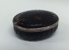 A large oval Antique silver and tortoiseshell snuf