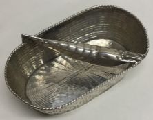 A rare Victorian silver basket of wicker design wi