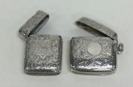 A silver hinged top vesta case together with one o