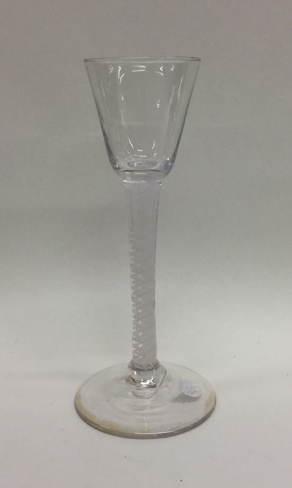 A Georgian air twist glass of tapering plain desig