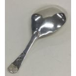 A Georgian OE pattern caddy spoon. London. By GS&W