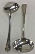 A pair of silver bead edge sauce ladles. London. B