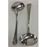 A pair of silver bead edge sauce ladles. London. B