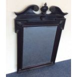 A Continental mahogany bevel edged mirror with scr