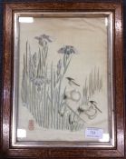 A framed and glazed Japanese silk depicting herons