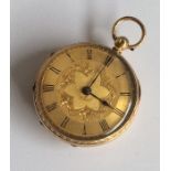 A lady's 18 carat fob watch attractively decorated