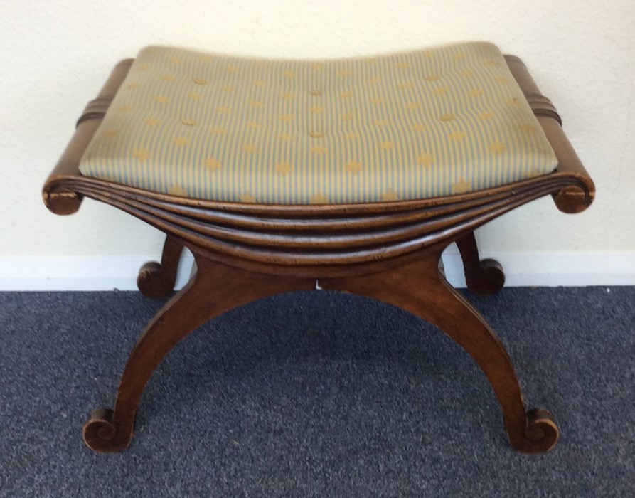 A Georgian style mahogany stool. Est. £30 - £50.