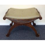 A Georgian style mahogany stool. Est. £30 - £50.