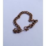 A 9 carat rose gold curb link bracelet. Approx. 7