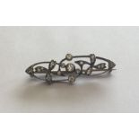 A Victorian diamond mounted brooch in the form of