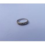 A good quality Antique diamond half eternity ring