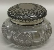 A silver hobnail cut powder jar with embossed deco