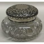 A silver hobnail cut powder jar with embossed deco