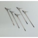 An attractive set of five silver cocktail sticks i