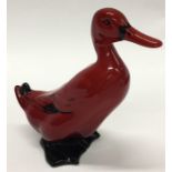 A Royal Doulton Flambe figure of a duck in bright