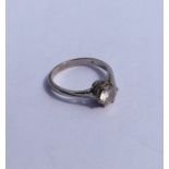 A diamond single stone mounted as a ring in claw m