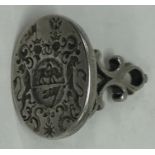 A Georgian silver seal with cast body attractively