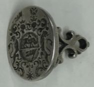 A Georgian silver seal with cast body attractively