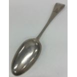 A Georgian Hanoverian pattern silver tablespoon with crest