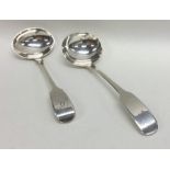 EXETER: A silver fiddle pattern cream ladle togeth