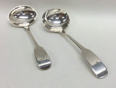 EXETER: A silver fiddle pattern cream ladle togeth