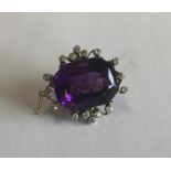 A good amethyst and diamond brooch with cut corner