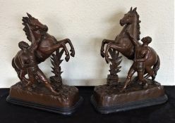 A pair of spelter figures of horses. Est. £30 - £40.