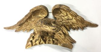 A gilded mount in the form of an eagle with outstr