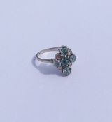 A good diamond and zircon cluster ring in platinum