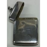 A plain heavy silver vesta case with gilt interior