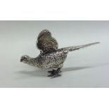 A miniature cast silver model of a hen pheasant wi