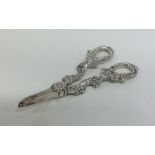 A heavy pair of silver cast grape scissors. London