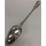 A fiddle and thread pattern large silver basting spoon wit