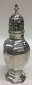 A tall Scottish baluster shaped silver caster. Edi