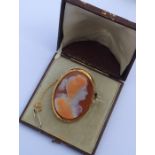 A large boxed hard stone cameo of a lady in gold f