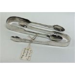 Two pairs of silver sugar tongs. Various Exeter ma