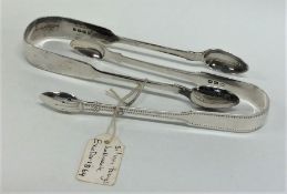 Two pairs of silver sugar tongs. Various Exeter ma